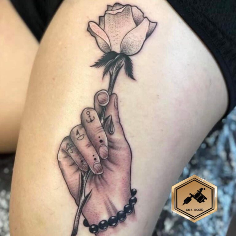 Black & grey flower tattoo done in San Antonio studio