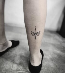 a close up of a tattoo on a leg